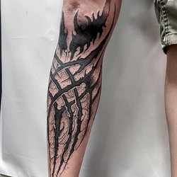 Тätowierungen am Bein